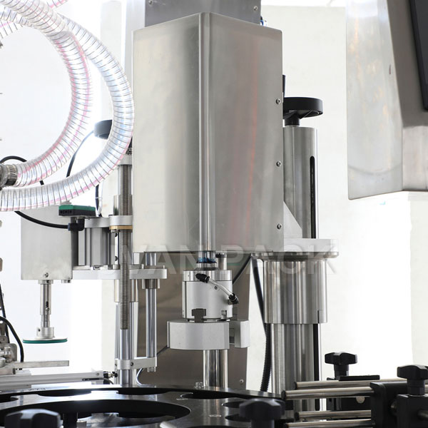 M&aacute;quina llenadora y taponadora-3