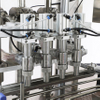 Máquina automática de llenado y tapado de botellas