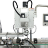 Máquina automática de llenado y tapado de botellas